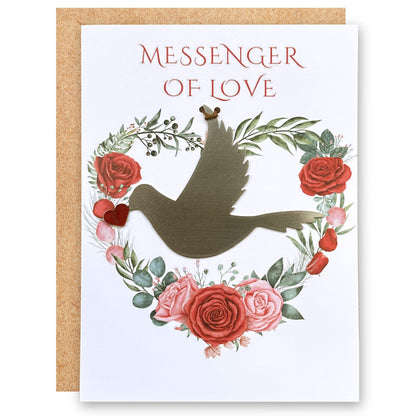 dove ornament placed on a Love greeting card entitled Messenger of love