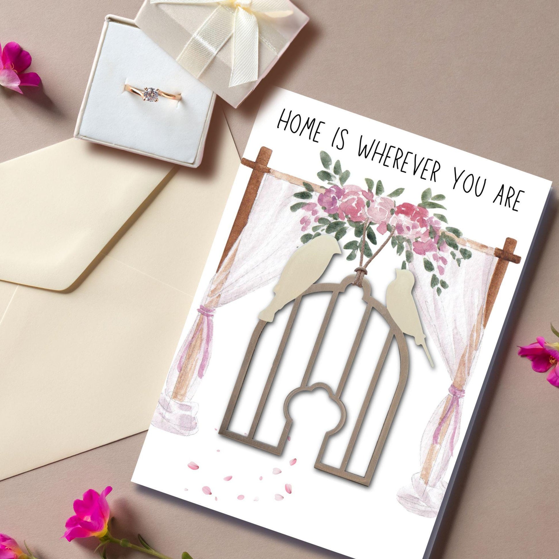 a card with a picture of a bird in a cage