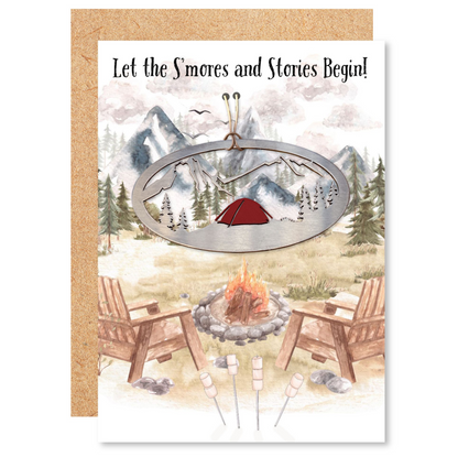 a card with a campfire and a tent