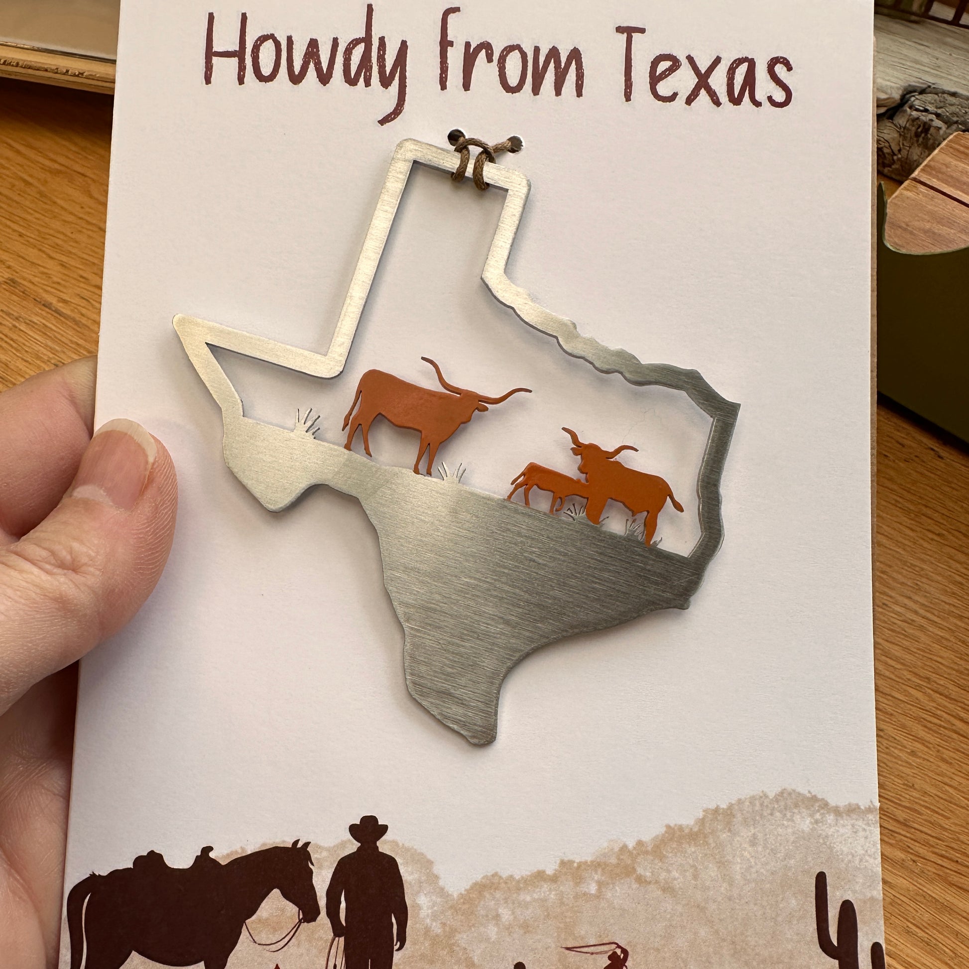 a card with a picture of a map of the state of texas