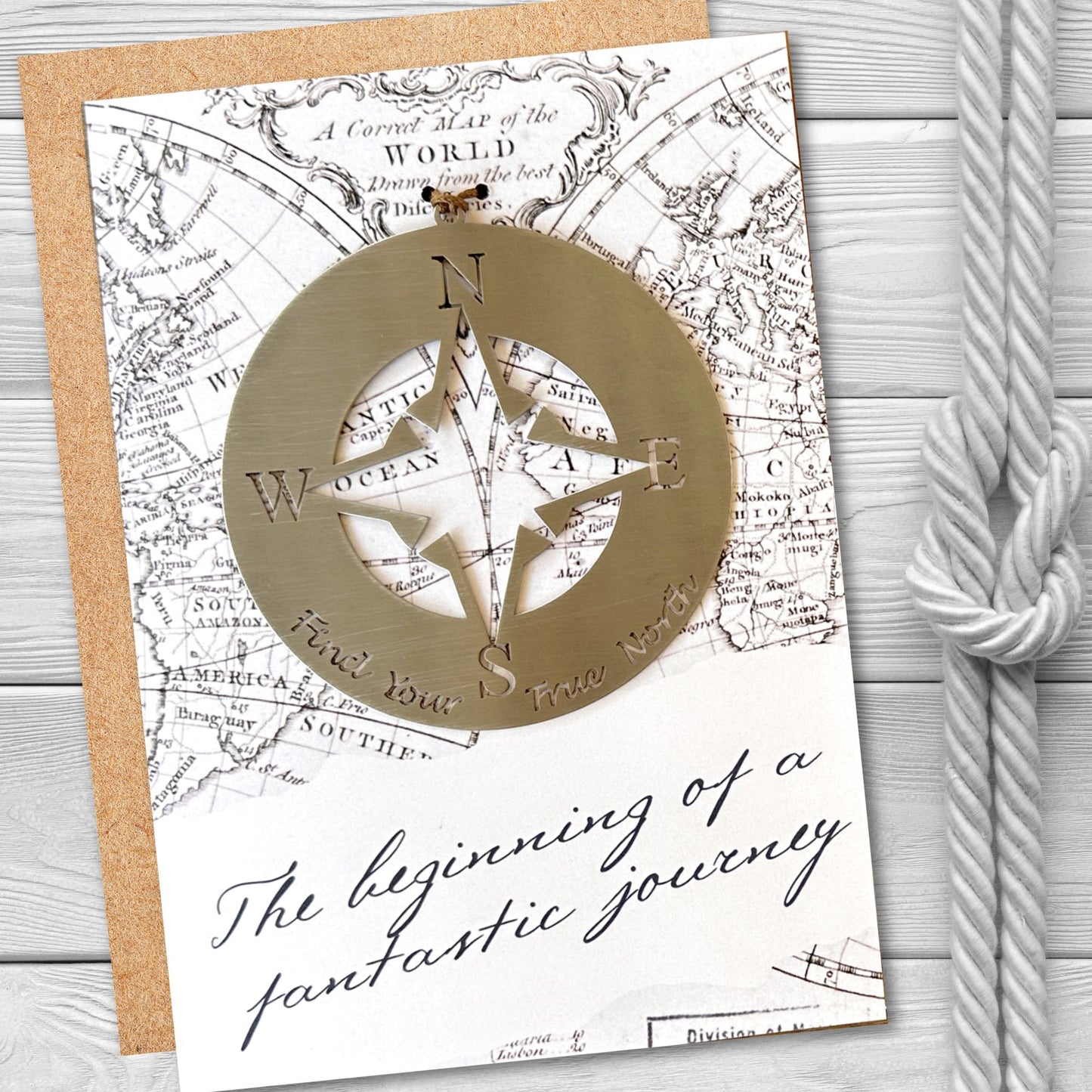 a greeting card with a compass on it