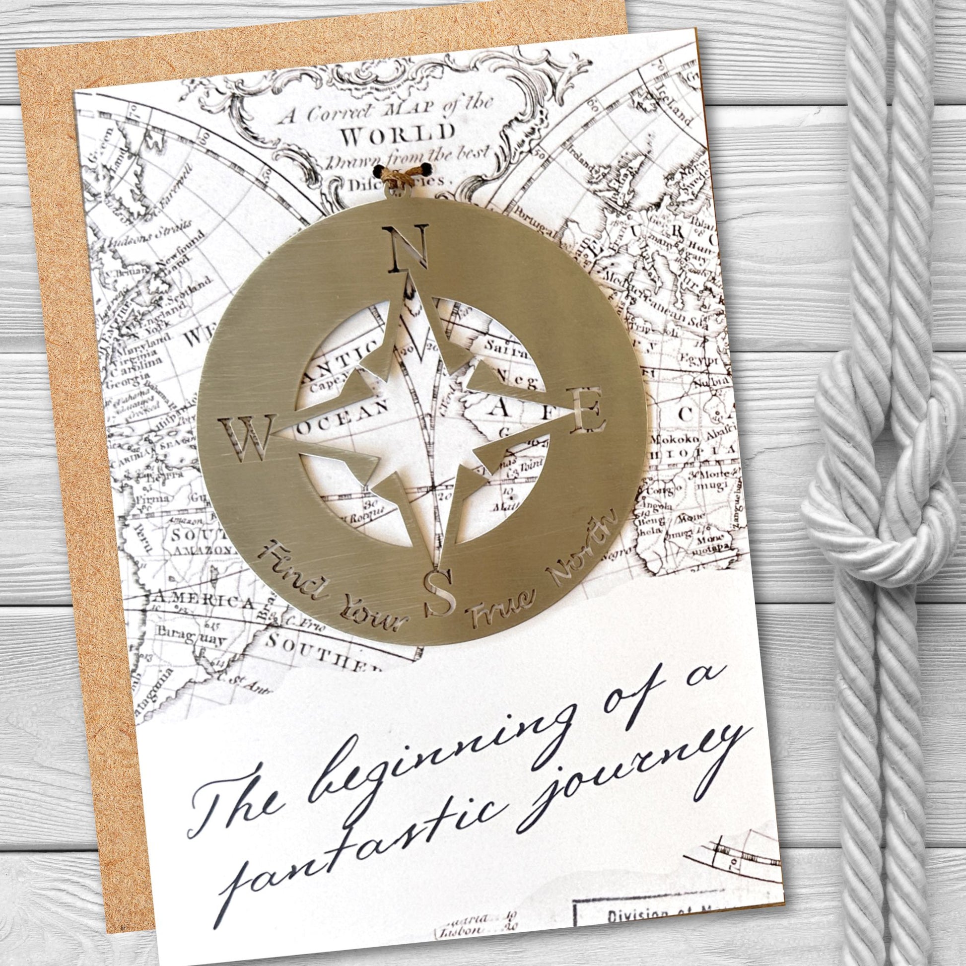 a greeting card with a compass on it