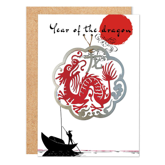 a chinese new year card with a dragon on a boat