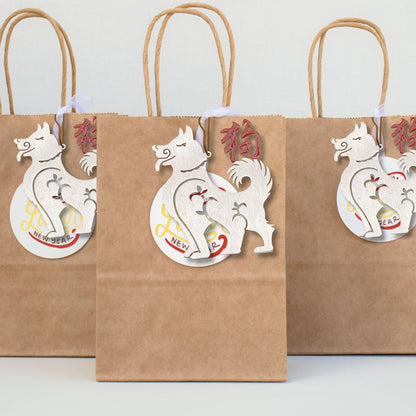 lunar year dog ornaments placed on gift bags